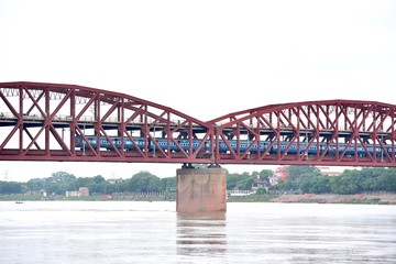 Red Railway Bridge Over the Ganges River in Varanasi