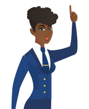 Stewardess with open mouth pointing finger up.