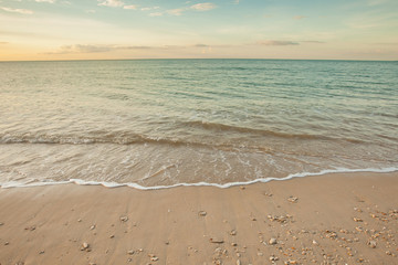 view of a beach before sunset