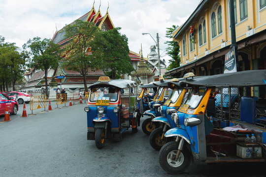  Thailand Tourist enjoys the ride in Tuk-Tuk in Bangkok, Thailand.
