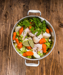 Metal stock pot with soup ingredients