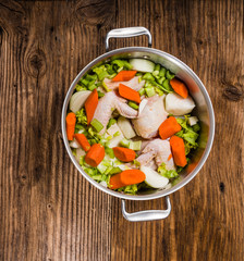 Metal stock pot with soup ingredients
