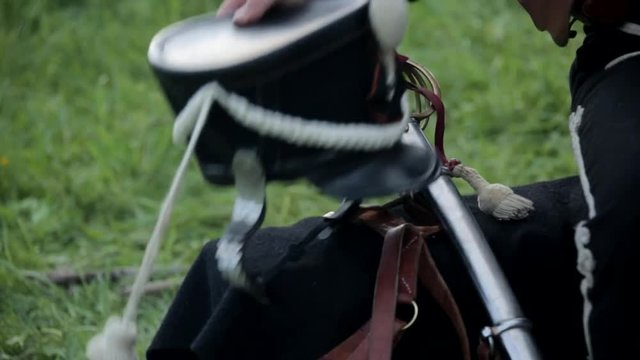 Hussar's saber and shako