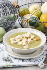 Creamy vegetable soup with croutons
