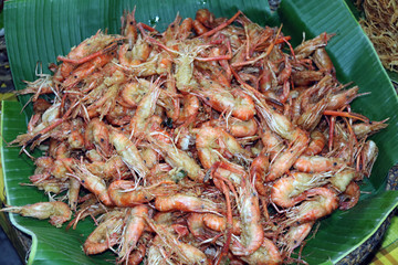 Crispy shrimp on banana leaf, Thai lifestyle food in the market.