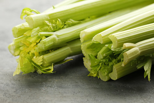 Celery on grey wooden table