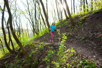 Girl running in the woods..