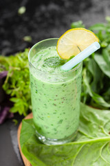 Healthy green vegetable smoothie with apples,spinach,cucumber