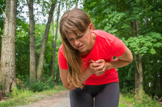 Woman is having heart attack during running activity
