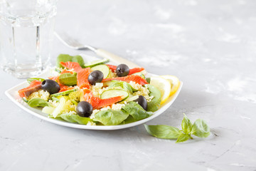 Salad with couscous and salmon