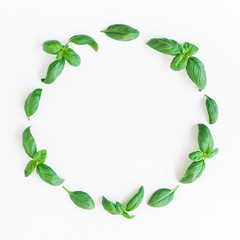 Basil wreath. Fresh green basil on white background. Flat lay, top view, copy space