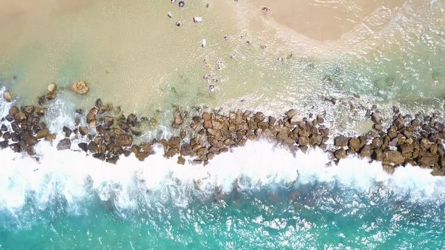 Tropical beach and wave breaker - Aerial shot