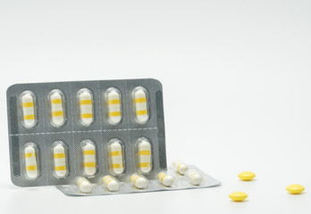 Anti-inflammatory medicine capsule pills on white background