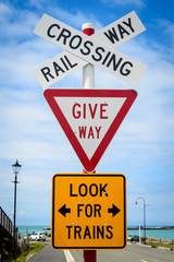 Railway crossing, Give way, Look for trains sign