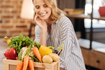 Charismatic motivated woman thinking about the recipe