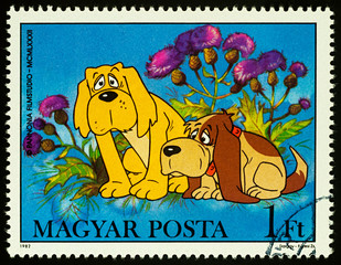 Two dogs on postage stamp