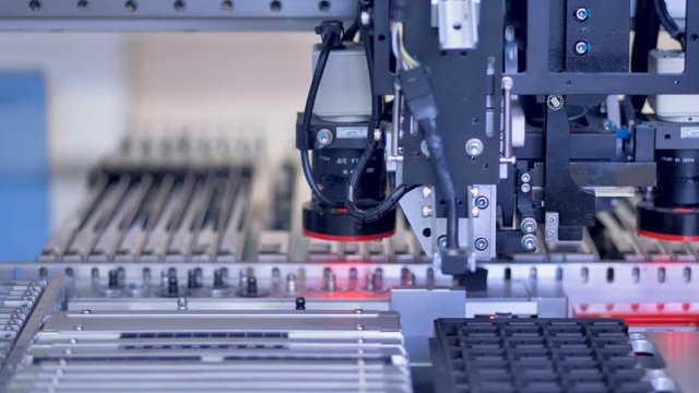 Electronic circuit board production on modern automated machine.