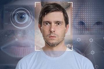Face detection and recognition of man. Computer vision and machine learning concept.