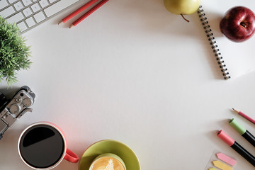 View from above with copy work space office accessories with business objects on white table office.Copy space for text or products display montage.