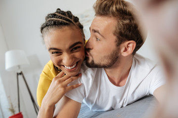 Fototapeta premium Young man being in love with his girlfriend