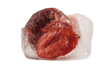Strawberry in ice cube isolated on white background