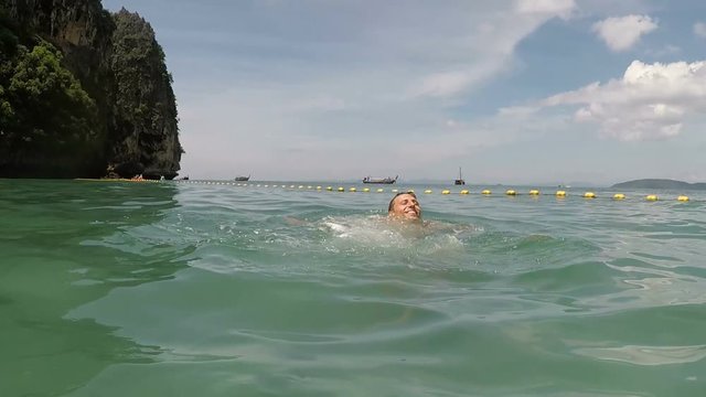 Happy Man Swimming In Sea Water Action Camera POV Of Young Guy On Beautiful Beach During Summer Vacation