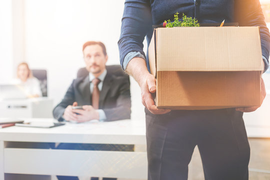 Disappointed savvy worker leaving the company