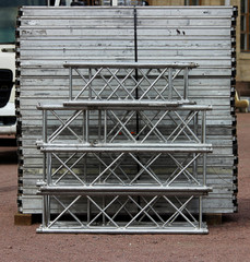 Details for the assembly of metal structures in the form of a scene before the celebration in the open air in the park.