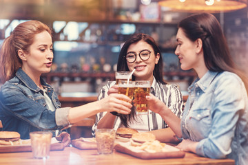Relaxed women touching their bocals