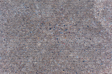 Concrete and little stones surface.