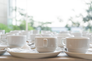 White cup of coffee for Customer service in hotell.