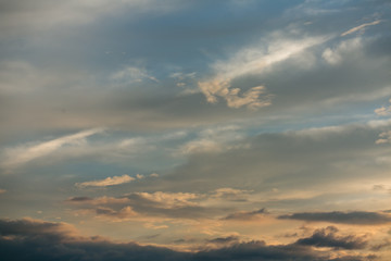 Naklejka na ściany i meble Beautiful sky with clouds and sun. Sunset sky with clouds.