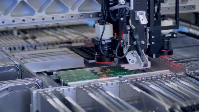 Motherboard elements production on modern equipment. 4K.