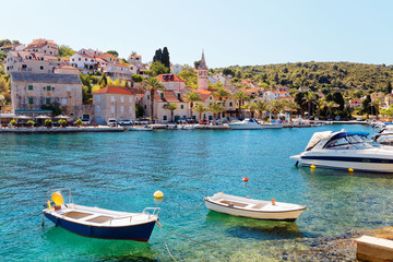 Fototapeta na wymiar Boats moored in the harbor of a small town Splitska - Croatia, island Brac