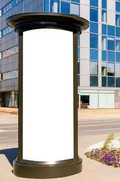 Advertising column mockup. Public information board in the street.