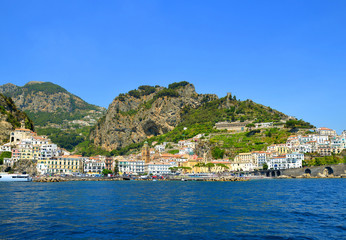 View of the beautiful town of Amalfi at famous coast in gulf of Salerno. Campania region, Italy.