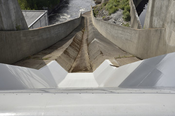 Obraz premium View dawn on a water outlet on a water power station