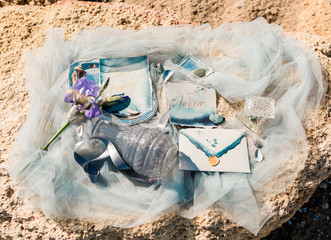 Wedding invitation cards on stone background.