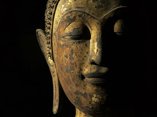 old gold buddha face