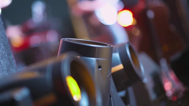 Entertainment, stroboscopes, colorful lights glow in the club.
