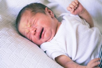 Closeup portrait of crying newborn baby boy - 166201901