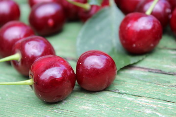 Cherries on a wooden board