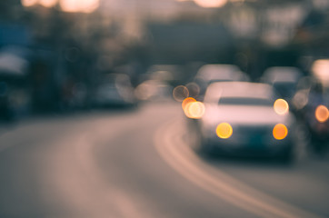 Fototapeta na wymiar Blur traffic road with colorful bokeh light abstract background.