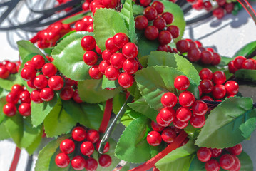 artificial berries of viburnum, made of fabric, background, focus selection