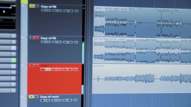 Sound waves on a computer monitor in a recording studio