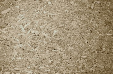 Natural beige wooden recycled compressed chips textured background
