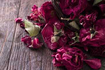 Fototapeta na wymiar Dried rose petals for tea, alternative medicine ,Copy space.
