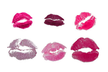 Pink tones lipstick kisses isolated on white