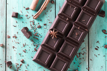 Dark chocolate stack, on wooden table,chocolate concept background