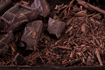 Dark chocolate stack, on wooden table,chocolate concept background